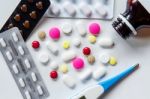 Top View Of The Pills On The White Background, Pack Of Tablet Drug And Capsule Pills On The Floor Stock Photo