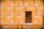 Wooden Wall With Door And Wood Floor In Front Off Stock Photo