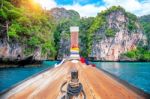 Long Boat And Blue Water At Maya Bay In Phi Phi Island, Krabi Thailand Stock Photo