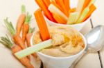 Fresh Hummus Dip With Raw Carrot And Celery Stock Photo