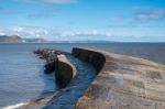 The Cobb Harbour Wall In Lyme Regis Stock Photo