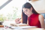 Adult Young Pretty Business Woman Working At Her Office. She Is Stock Photo