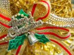 Golden Glitter Christmas Decoration With Little Jingle Bell And Stock Photo