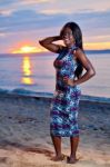 Beautiful Black African American Woman Posing On The Beach At Su Stock Photo