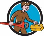 Plumber Carrying Monkey Wrench Toolbox Circle Stock Photo