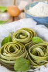 Traditional Italian Raw Homemade Spinach Pasta Stock Photo