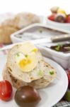 Slices Of Bread And Butter With Tomatoes, Peppers And Pate Stock Photo