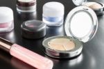 Woman Cosmetic Foundation And Eyeshadow Stock Photo