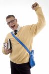 Winning Student Holding Books Stock Photo