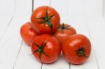 Red Tomatoes Fruits Isolated On White Stock Photo