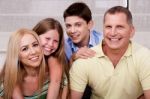 Portrait Of Happy Family Of Four Stock Photo