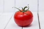 Tasty Tomato On A White Background Stock Photo