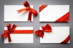 Card With Red Ribbons Bows Stock Photo