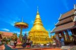 Wat Phrathat Hariphunchai Golden Pagoda In Lamphun,thailand Stock Photo