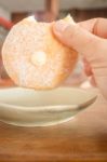 Cream Donut On Vintage Background Stock Photo