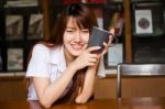 Portrait Of Thai Adult Student University Uniform Beautiful Drinking Coffee Stock Photo