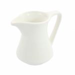 Top Side Of Ceramic Milk Jug On White Background Stock Photo