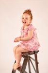 Little Girl Fashion Model In Rose Dress Stock Photo