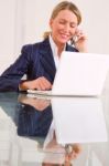 Businesswoman With Mobile Stock Photo