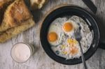 Fresh Fried Eggs On Oil Stock Photo