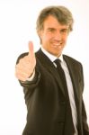 Businessman With Thumb Up Stock Photo