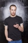 Male holding smartphone Stock Photo