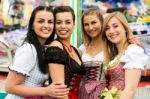 Gorgeous Young Women At German Funfair Stock Photo