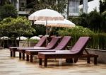 Outdoor Couches With Umbrellas Stock Photo