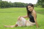 Beautiful Girl Relaxing In The Park Stock Photo