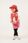 Little Girl Fashion Model With Red Cap Stock Photo