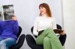 Women In Waiting Room Stock Photo