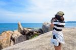 Woman Taking Photos At The Hin Ta Hin Yai Stock Photo