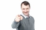 Smiling Man Pointing You Out Stock Photo