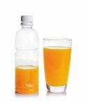 Plastic Bottle And Glass Of Orange Juice Stock Photo