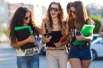 A Group Of Friends Talking In The Street After Class Stock Photo