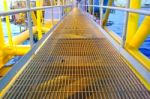 Bridge And Handrail With Grating On Offshore Platform With Light Stock Photo