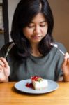 Beautiful Woman With A Cake In Cafe Stock Photo