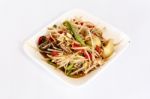 Thai Food Papaya Salad On White Dish Stock Photo