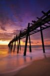 Wooden Bridge In Sea Stock Photo