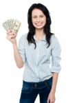 Attractive Young Woman Holding Money Stock Photo