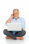 Old Man With Laptop Mobile Phone Stock Photo