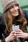 Young Woman Shopping In The City With His Mobile Phone Stock Photo