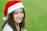 Beautiful Young Santa Clause Woman Stock Photo