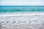 Sand Beach With Blue Ocean Stock Photo