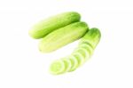 Cucumber Whole And Sliced On White Background Stock Photo