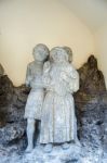 Statue Of Three Men Outside St James Church In Rothenburg Stock Photo