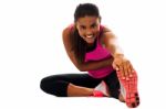 Fitness Girl Doing Stretching Exercise Stock Photo