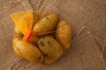 Potato Still Life On Sack Background Flat Lay Stock Photo