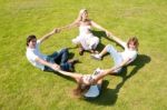 Happy Family Playing In Garden Stock Photo