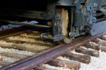 The Old Train Wheels And A Rusty Rail Road Stock Photo